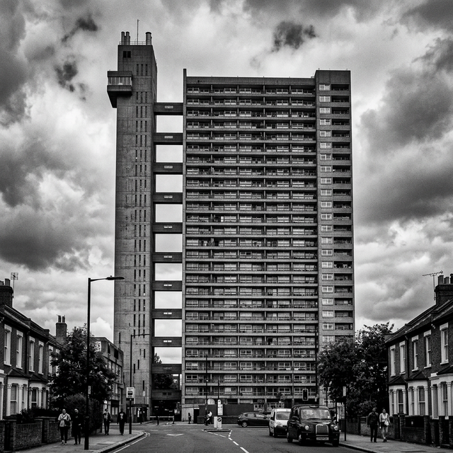 The towering silhouette of Trellick Tower, showing the distinct service elevator shaft connected by walkways